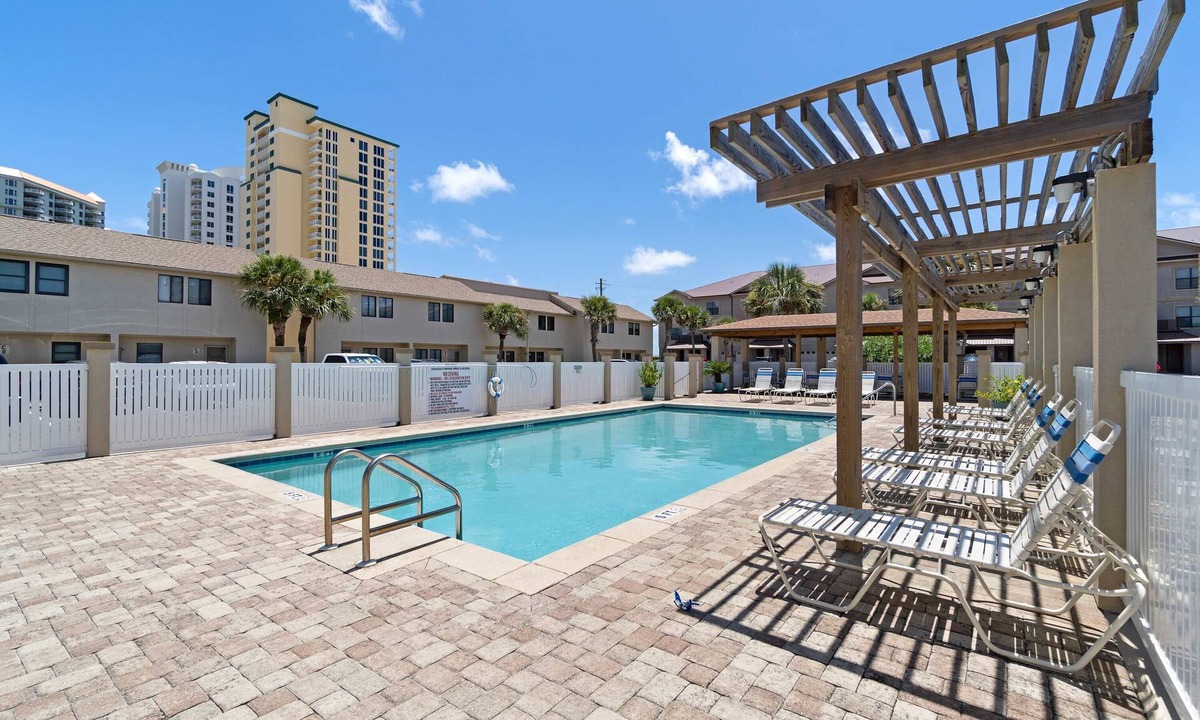 Sugar Beach Condo | Beachfront townhome w/on-site beach access, heated pool, patio, grill, AC, W/D
