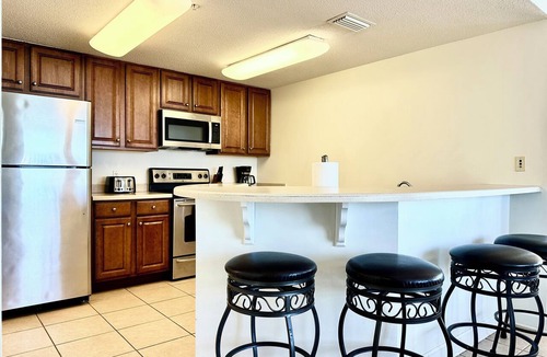 Lower Grand Lagoon Condo | 22nd Floor Penthouse 120’ Wrap Balcony Gulf Front Walk to Schooners Sleeps 8