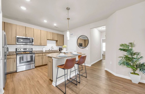 Northside Apartment | 2BR Family Suite - GAMES! Pet-Friendly! POOL!