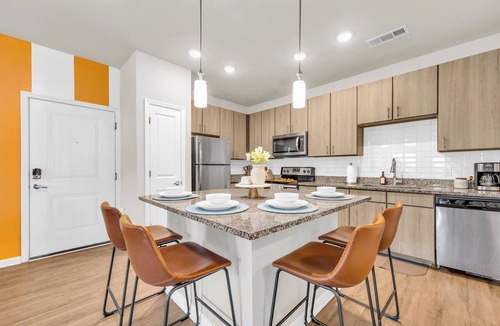Northside Apartment | 2BR Family Suite - GAMES! Pet-Friendly! POOL!