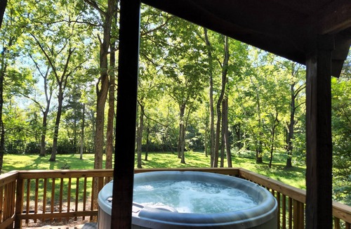 Rileyville Cabin | Adorable river front cabin ,with hot tub on the River