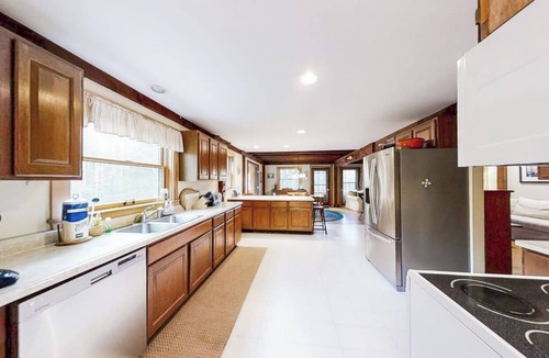 Bayville Cabin | Appalachee Pond Waterfront Cottage | Decks, Sunroom, Dock with Kayaks & Canoe