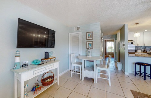 Miramar Beach Condo | Beach-themed condo w/shared pool, easy beach access, patio & outdoor dining area