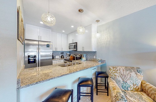 Miramar Beach Condo | Beach-themed condo w/shared pool, easy beach access, patio & outdoor dining area