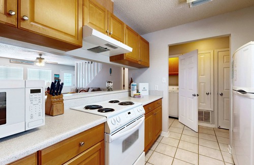 Sugar Beach Condo | Beachfront townhome w/on-site beach access, heated pool, patio, grill, AC, W/D