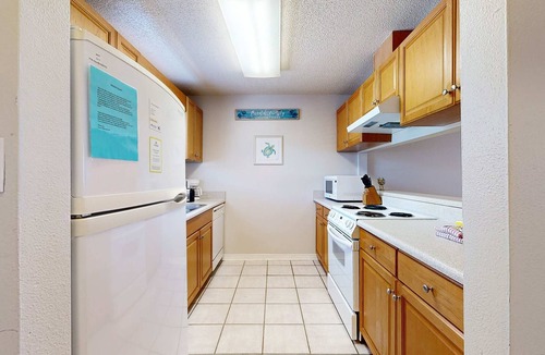 Sugar Beach Condo | Beachfront townhome w/on-site beach access, heated pool, patio, grill, AC, W/D