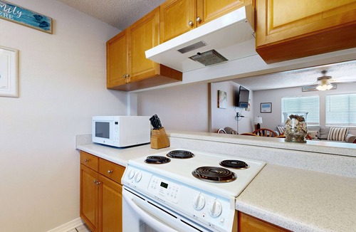 Sugar Beach Condo | Beachfront townhome w/on-site beach access, heated pool, patio, grill, AC, W/D