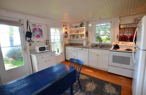 Spruce Head House | Berry Cottage, private dock, overlooking a sandy b