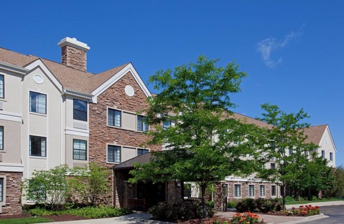 Half Day Condo | Business District Suite with Pool Access, Free Breakfast + Weekday Shuttle