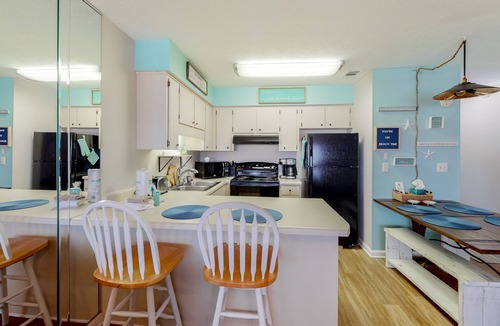 West Panama City Beach Condo | Comfortable condo w/2 patios & shared pool/tennis - beach across the street