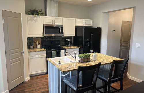Meridian House | Contemporary Townhome close to shopping and dining.