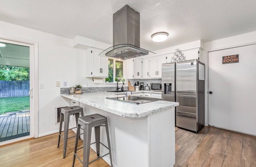 West Bench Cottage | Cozy Boise Gem: Private Yard, Game Room & Workspace