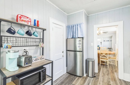 South Pensacola House | Cozy Bungalow near Downtown Pensacola: Game Room, Patio + Fire Pit, 3 Bedroom!
