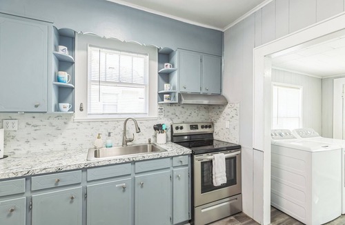 South Pensacola House | Cozy Bungalow near Downtown Pensacola: Game Room, Patio + Fire Pit, 3 Bedroom!