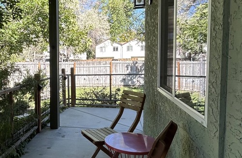 Veterans Park House | Cozy cottage with private backyard. Fire pit, hot tub, bikes, and paddleboards
