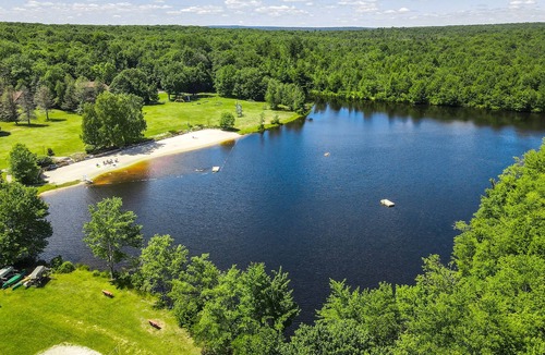 White Haven House | Dog-friendly home near golf, skiing, lake, and beach w/large yard, firepit, WiFi