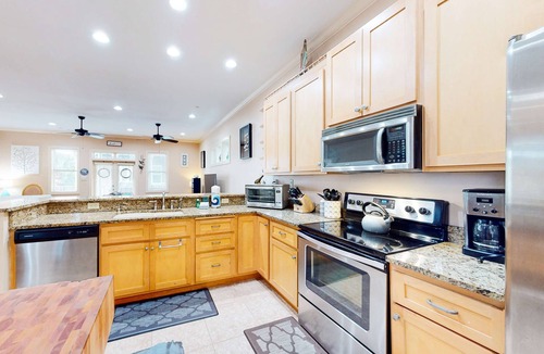 Crescent Beach House | Dog-friendly home with balconies, foosball, pool access, & W&D - steps to beach