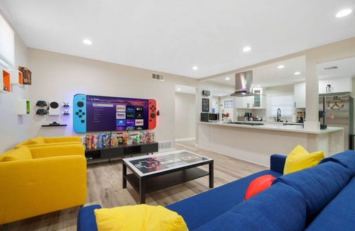 Fullerton House | 🕹️🎬🏎️👾Gamers Getaway: Arcade ,Theater, Racing, And More!