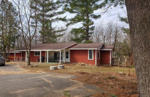 Waupaca House | Group Friendly! Riverfront Waupaca Retreat w/Yard