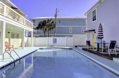 Panama City Beach Villa | Gulf View Condo with Pool & Grills. Minute walk to Beach. Pet-Friendly!