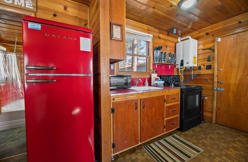 The Village House | Highland Hideaway - Walk to Lake & Village, Pet Friendly, Fenced Yard