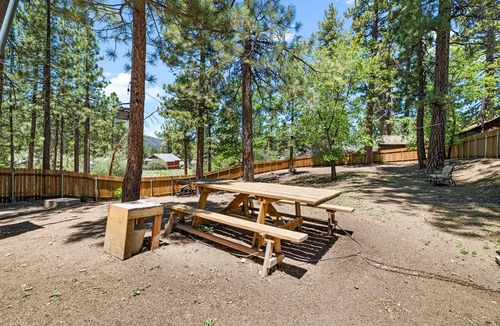 The Village House | Highland Hideaway - Walk to Lake & Village, Pet Friendly, Fenced Yard