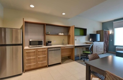Upper Grand Lagoon Hotel | Indulge in Home Like Comfort w/Pool & Gym Onsite + Free Breakfast