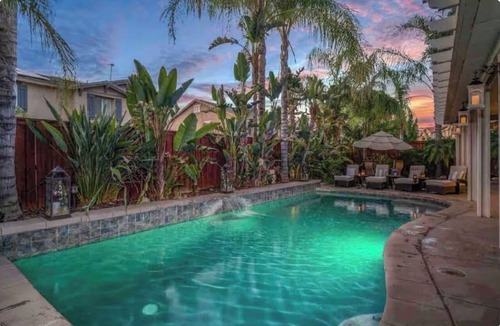 Lake Elsinore House | Kimberly's Chandelier Château Salt Pool & XL Hot Tub