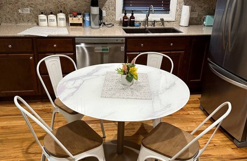 North Chicago Apartment | King Bed Private Backyard Grill and Fireplace