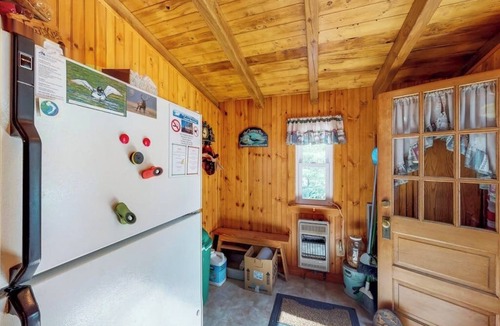 Greenville House | Lakefront cabin with private boat ramp, lake access, wrap-around porch, firepit