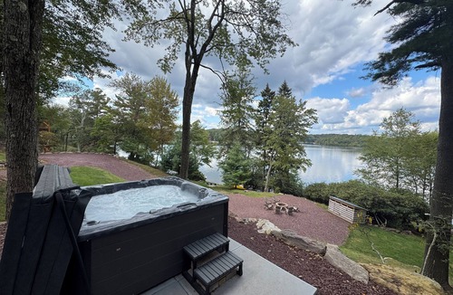 Lake Harmony House | Lakefront Cabin w/Hot Tub, Views & Fireplace