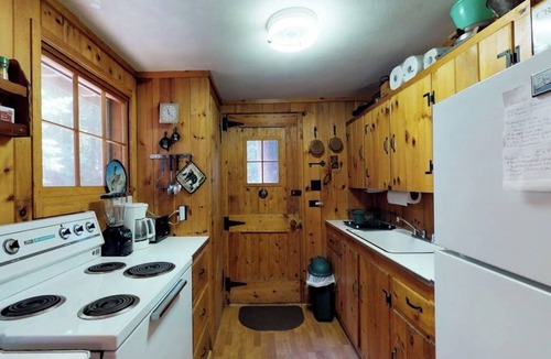 Greenville Junction Cabin | Lakefront cabin with private dock & beach access