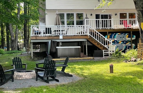 Pocono Lake House | Lakefront Hot Tub Private Dock Kayaks Canoe Fire Pit Dog Friendly