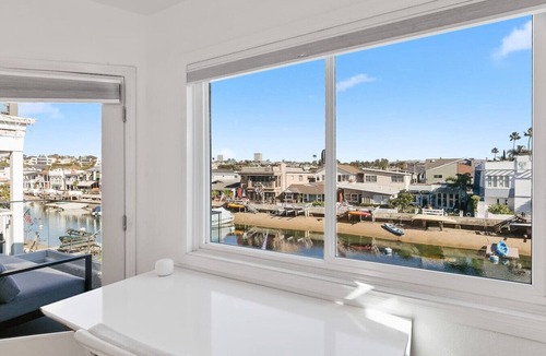 Balboa Island House | Large home at Center of Island, water views, garage, fire pit, dock, AC, linens