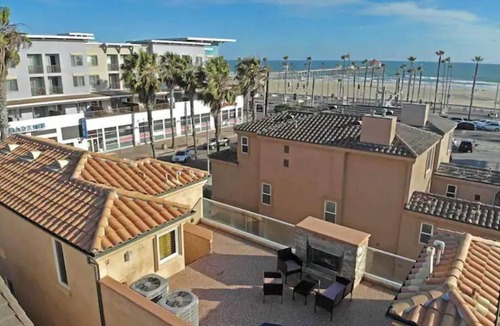 Huntington Beach House | Life’s a beach…house with gorgeous ocean&pier views. A few steps to the waves.,.