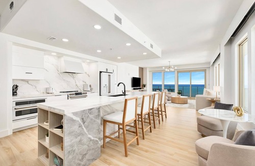 Thomas Drive Condo | Luxurious renovated Gulf-front condo with complimentary Beach Chair Service!
