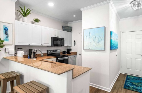 Frangista Beach Condo | Modern 2br/2ba, Pet friendly, steps to private beach access and restaurants!