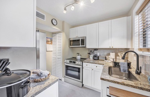 San Marco House | newly renovated chic house with covered patio & yard steps from San Marco Square