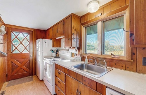Owls Head Cabin | Peaceful coastal cabin with screened porch, water view of the cove, dog-friendly