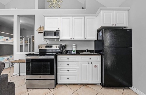 Crystal Shores House | Pink Beach View Entire Home - Top & Bottom Units - 3 Min Walk to Beach