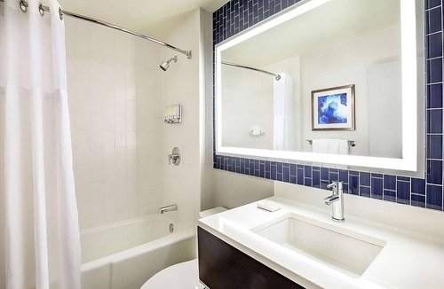 East Cambridge Hotel | Relax In Comfortable King Size Bed w/Onsite Pool