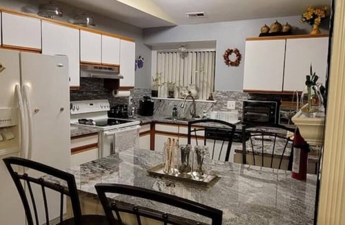 Canton Condo | Ruby's private 2-bedroom home with recently renovated floors.