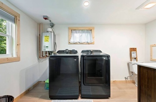 Canaan House | Salt water hot tub, king size beds, dog friendly, lake front, dock, boat launch