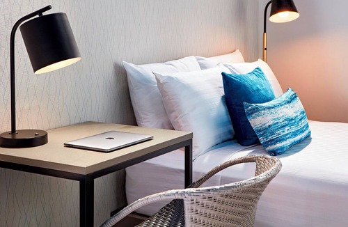 North Pacific Beach Hotel | Serene Beachside Room Ideal for Family Ocean Fun