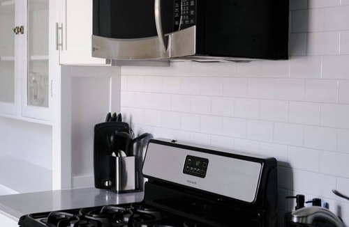 Irving Park East Apartment | Sleeps 7 Huge Projector Designated Workspace