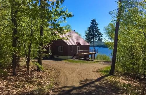 Greenville Junction House | Spectacular lakefront home with dock, firepit, & vaulted ceilings - dog-friendly
