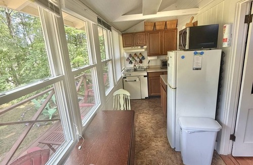 South Casco Cabin | STEPS AWAY FROM A SHARED SANDY BEACH. BOAT SLIP ON THOMAS POND