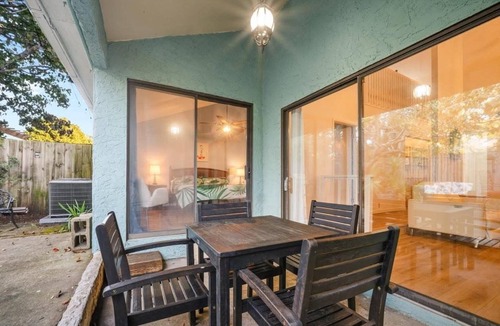 Thomas Drive House | Sunsets on Lagoon Beach Getaway – Grill, Private Patio, Golf Carts Welcome