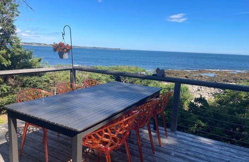 Prospect Harbor House | Take in the breathtaking views at our popular oceanside cottage with large deck.