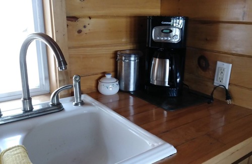 Orland Cottage | The loons are calling you! Your peaceful, waters edge retreat awaits!